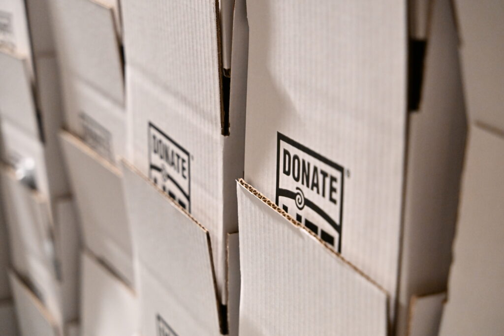 Stacked Donate Life boxes waiting to get filled with snacks to send to hospital partners during the holidays.